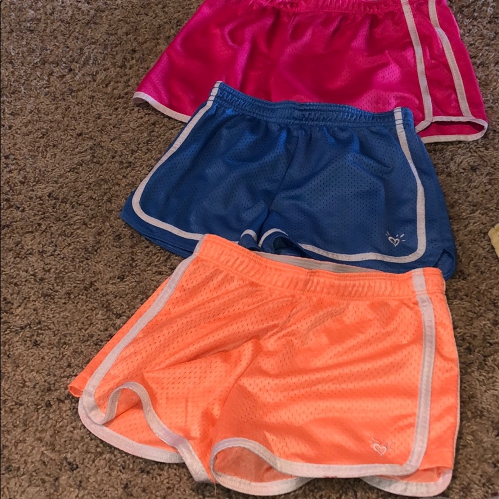 justice shorts size-10 blue and orange / 14 pink